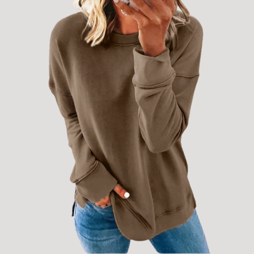 Women's oversized long sleeve crew neck sweater with a longer back hem