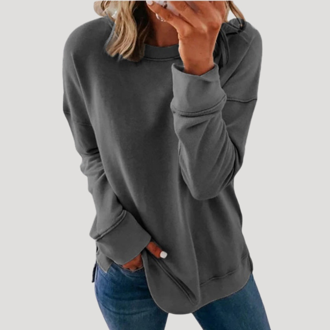 Women's oversized long sleeve crew neck sweater with a longer back hem