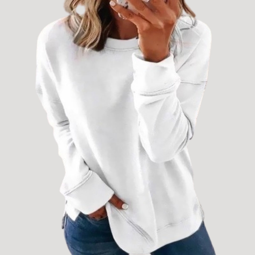 Women's oversized long sleeve crew neck sweater with a longer back hem