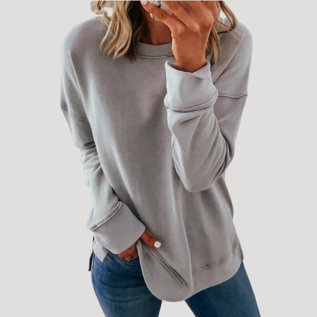 Women's oversized long sleeve crew neck sweater with a longer back hem