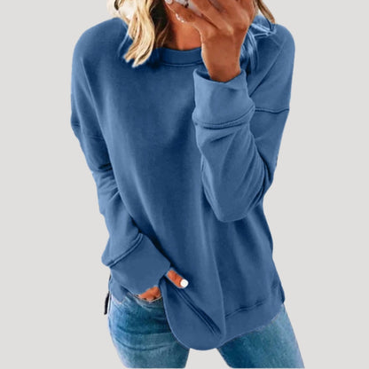 Women's oversized long sleeve crew neck sweater with a longer back hem