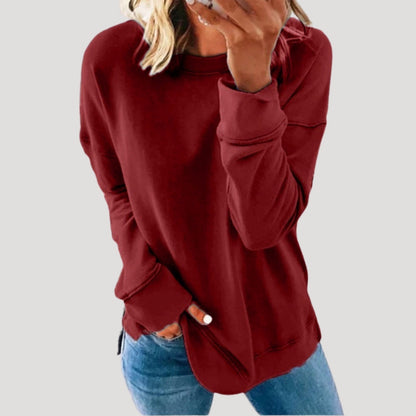 Women's oversized long sleeve crew neck sweater with a longer back hem