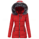 Women's quilted hooded jacket with faux fur trim and zipped pockets