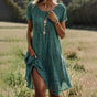 Women's summer midi dress with small white dot print and short sleeves