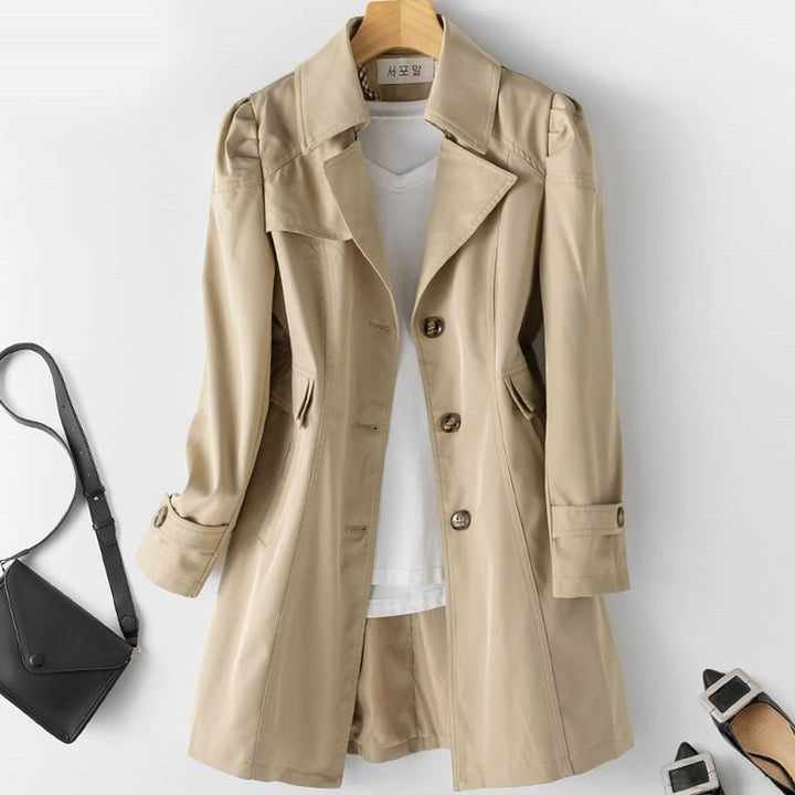 Women's long trench coat with notched lapel, button front and flap pockets