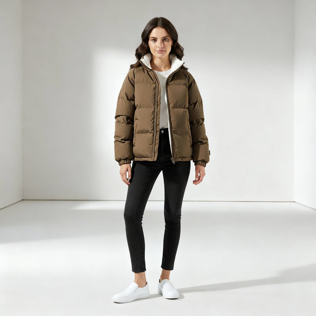 Women's hooded quilted puffer jacket with contrasting fleece-like lining and zip front