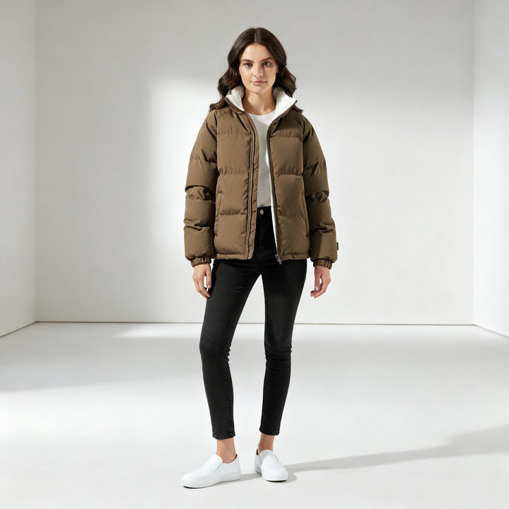 Women's hooded quilted puffer jacket with contrasting fleece-like lining and zip front