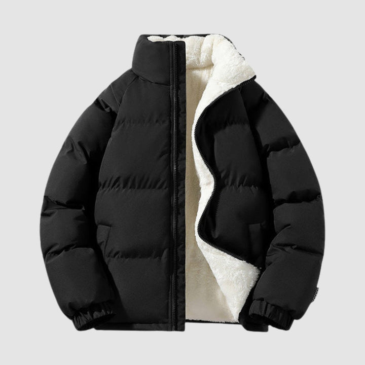 Women's hooded quilted puffer jacket with contrasting fleece-like lining and zip front