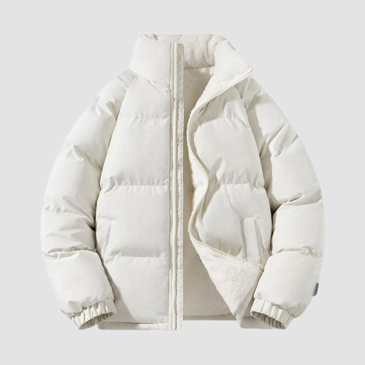 Women's hooded quilted puffer jacket with contrasting fleece-like lining and zip front