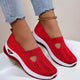 Women's knit slip-on sneakers with rounded toe and contrasting sole