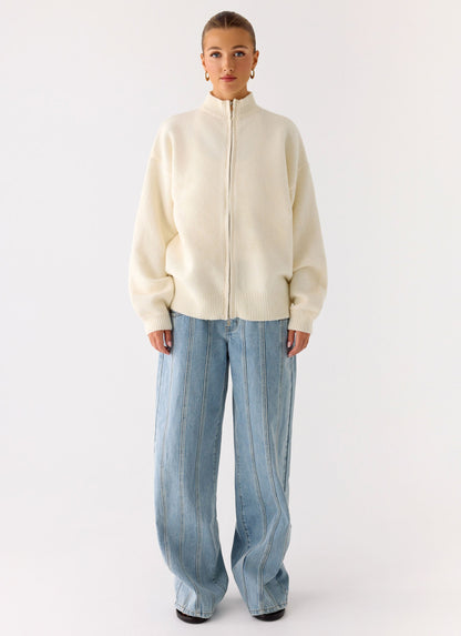 Women's ivory knit jacket with mock neck, front zip and ribbed trims