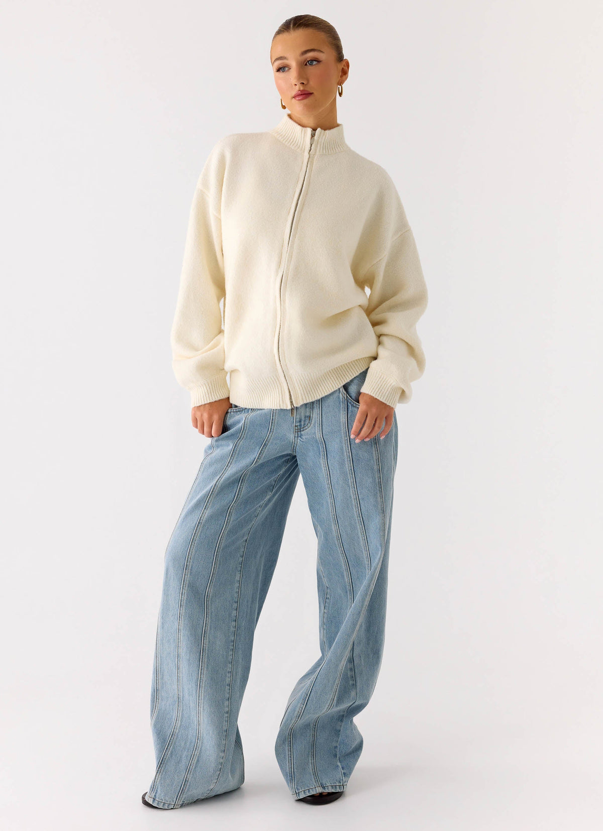 Women's ivory knit jacket with mock neck, front zip and ribbed trims