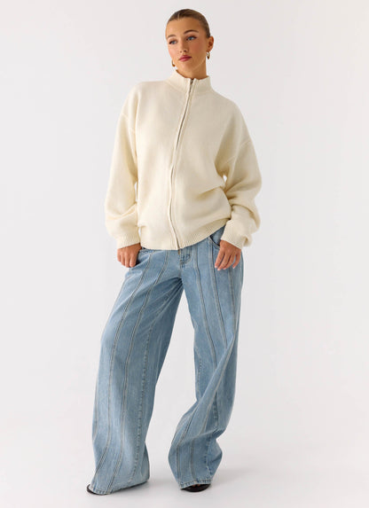 Women's ivory knit jacket with mock neck, front zip and ribbed trims