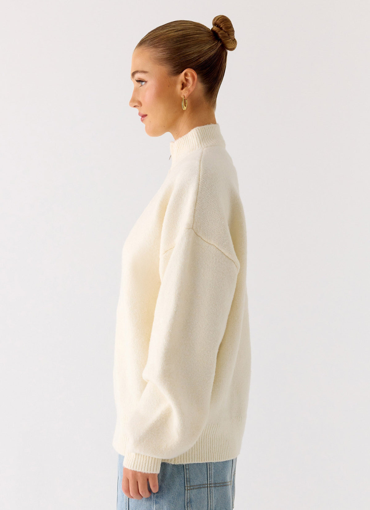 Women's ivory knit jacket with mock neck, front zip and ribbed trims