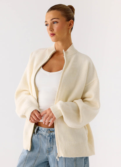 Women's ivory knit jacket with mock neck, front zip and ribbed trims