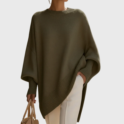 Women's oversized poncho sweater with crew neck and ribbed cuffs