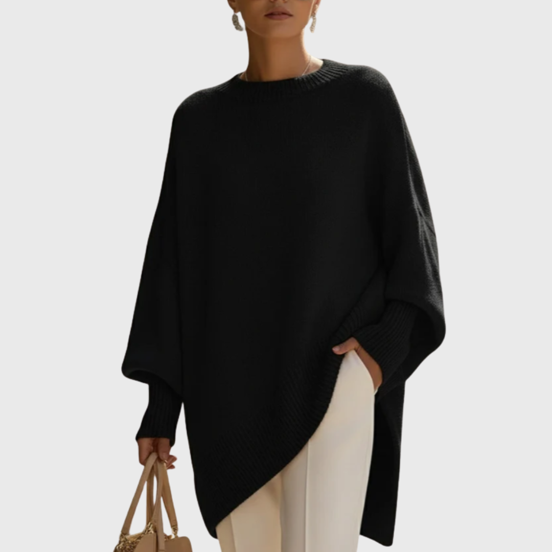 Women's oversized poncho sweater with crew neck and ribbed cuffs