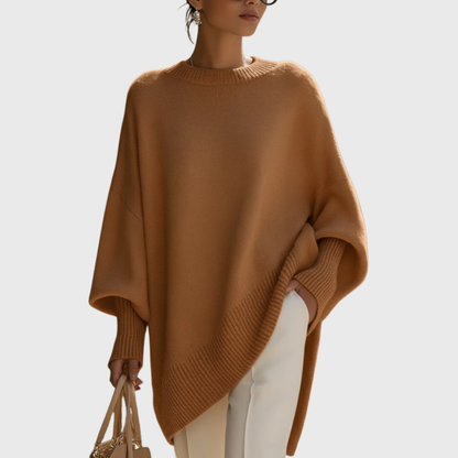Women's oversized poncho sweater with crew neck and ribbed cuffs