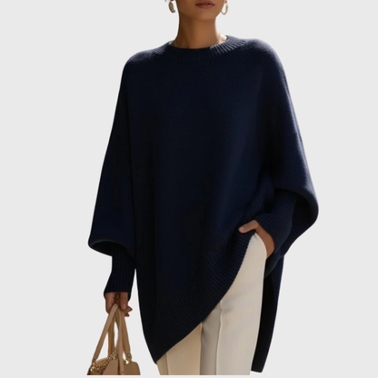 Women's oversized poncho sweater with crew neck and ribbed cuffs