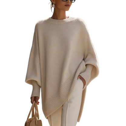 Women's oversized poncho sweater with crew neck and ribbed cuffs
