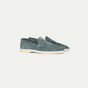 Men's blue slip-on loafers with moc toe stitching and flat cream soles