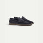 Navy men's penny loafers with moccasin stitching and brown sole