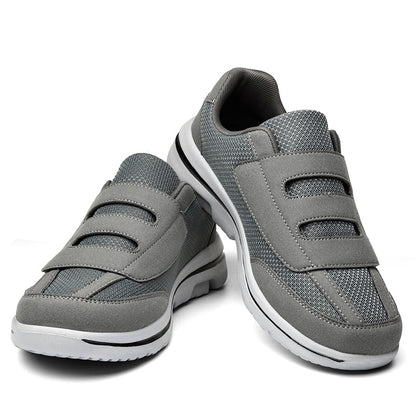 Women's wide toe slip-on sneakers with hook-and-loop straps and layered soles