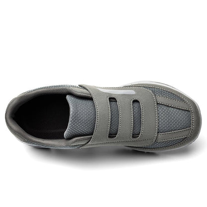 Women's wide toe slip-on sneakers with hook-and-loop straps and layered soles