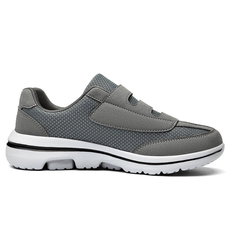 Women's wide toe slip-on sneakers with hook-and-loop straps and layered soles