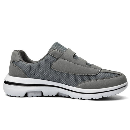 Women's wide toe slip-on sneakers with hook-and-loop straps and layered soles