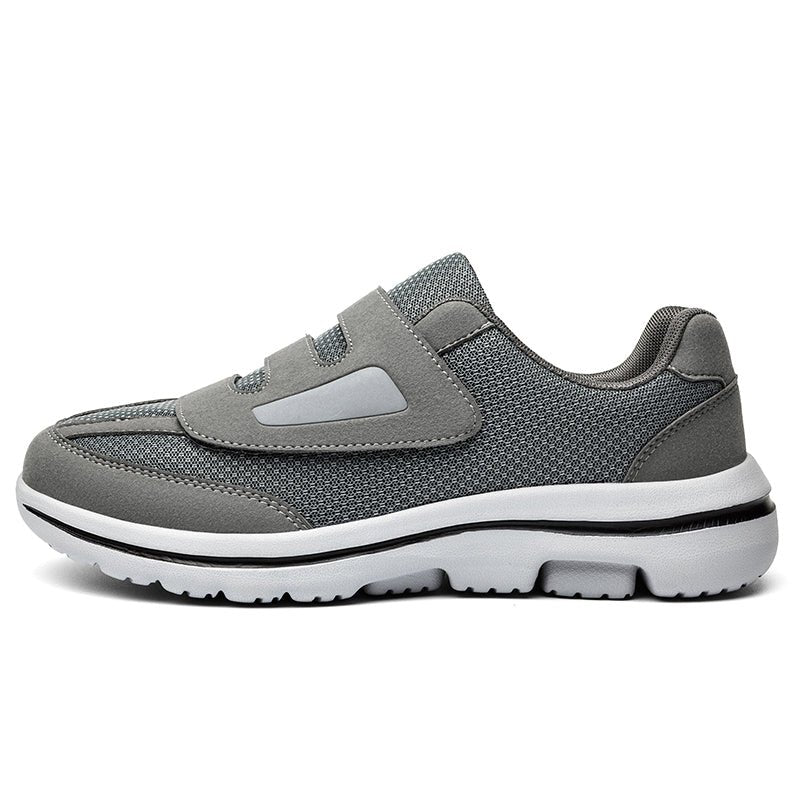 Women's wide toe slip-on sneakers with hook-and-loop straps and layered soles