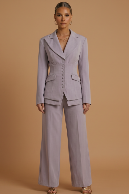 Women's tailored two-piece suit with peaked lapel jacket and wide-leg trousers
