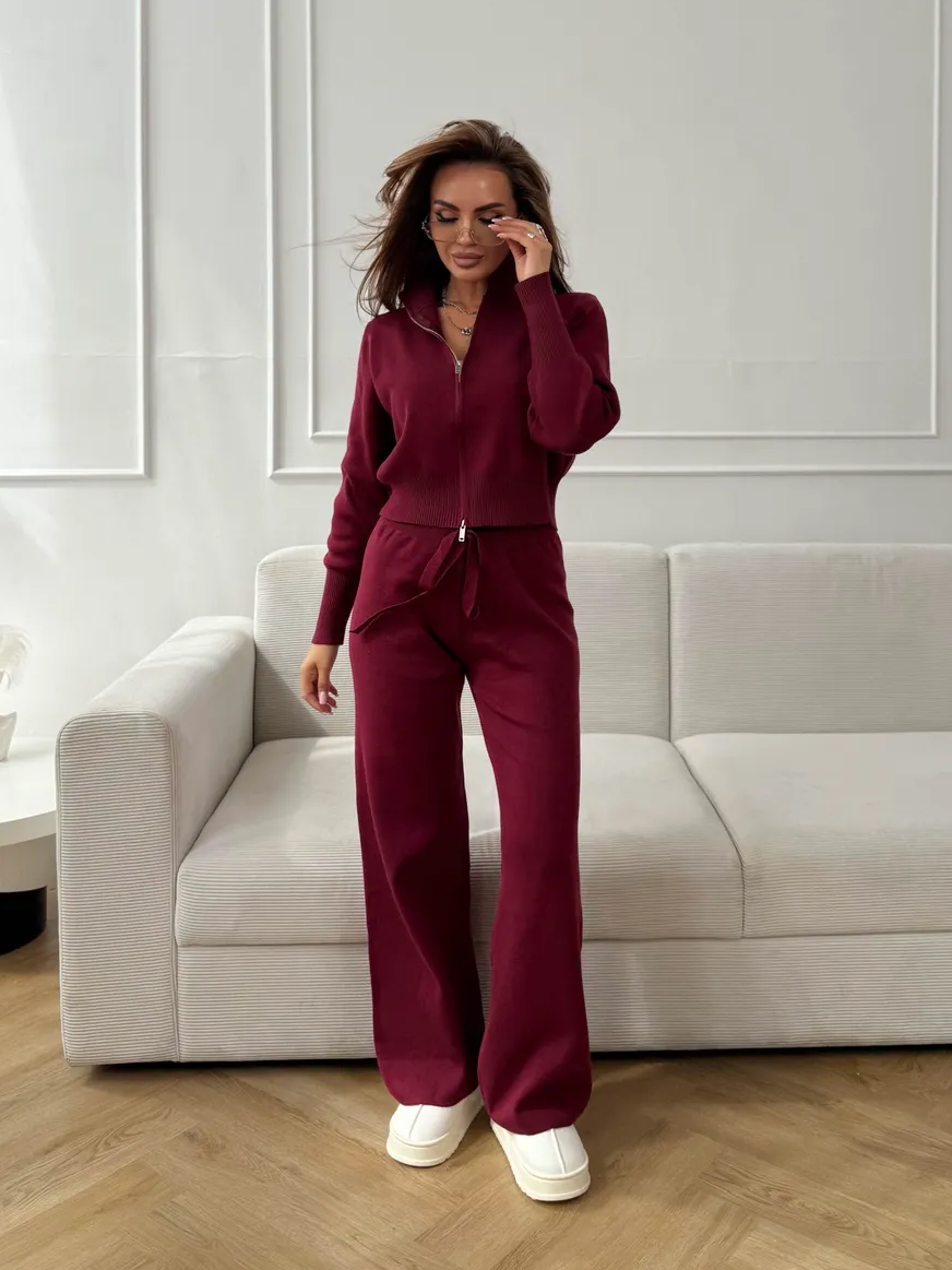 Woman wearing a two-piece knit sweater and wide-leg trouser set