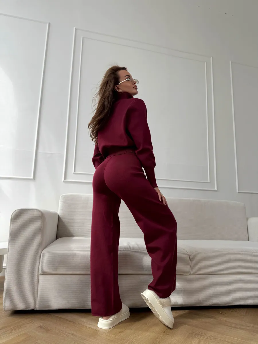 Woman wearing a two-piece knit sweater and wide-leg trouser set