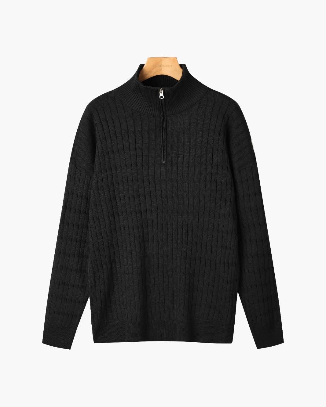 Half zip ribbed sweater in cream and black with crew neckline and long sleeves