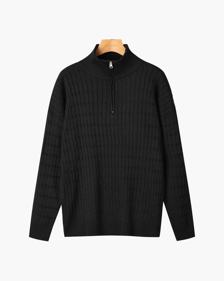 Half zip ribbed sweater in cream and black with crew neckline and long sleeves