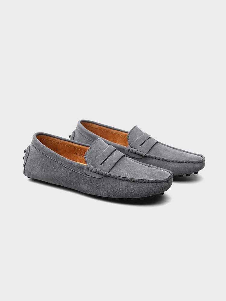 Suede boat loafers with moc stitching and penny-style straps