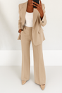Women's two-piece trouser suit with notch-lapel blazer and straight-leg trousers