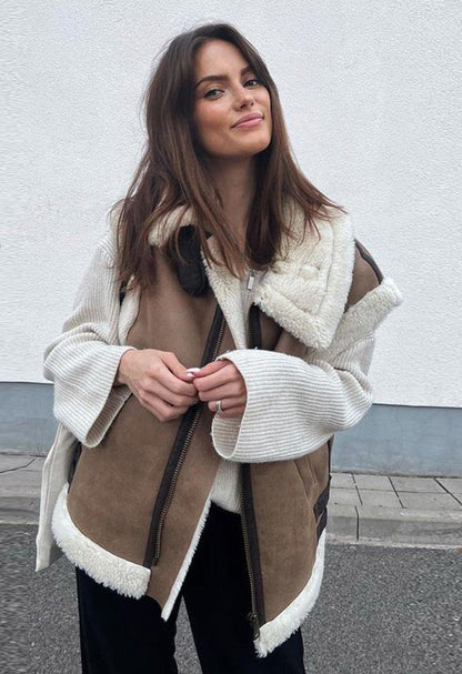 Women's sleeveless jacket with plush trim, turn-down collar and zip front