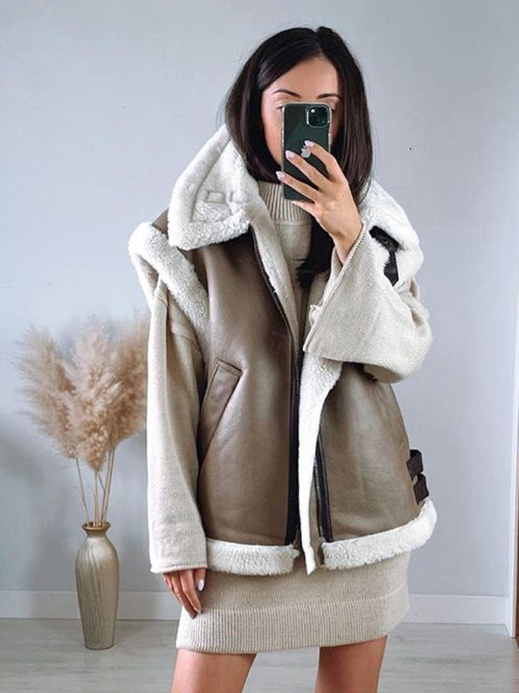 Women's sleeveless jacket with plush trim, turn-down collar and zip front
