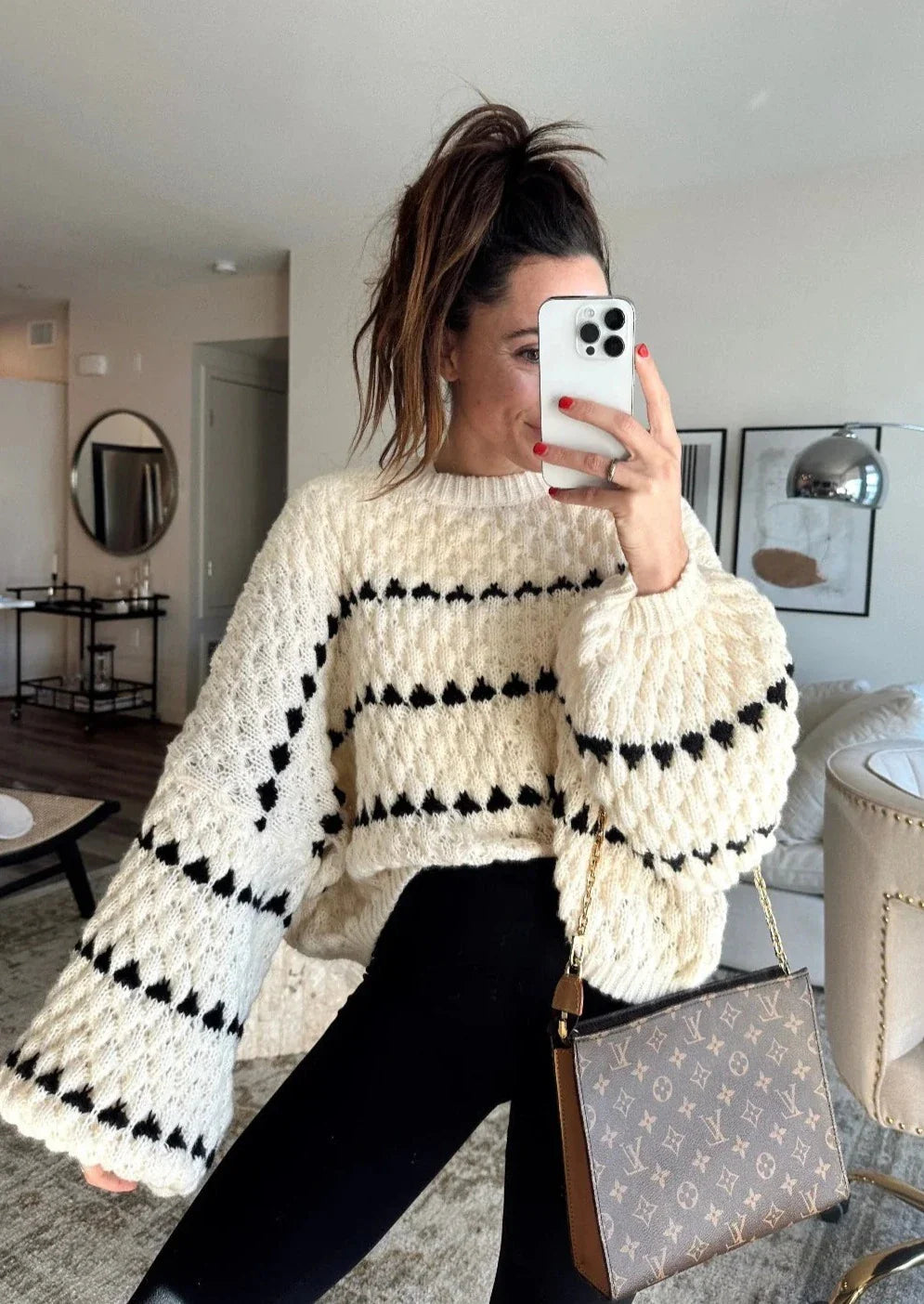 Women's textured crew neck sweater with contrasting geometric pattern