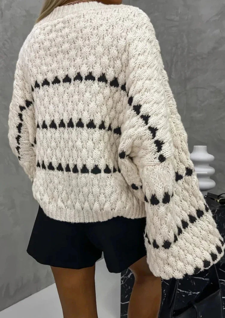 Women's textured crew neck sweater with contrasting geometric pattern