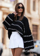 Women's textured crew neck sweater with contrasting geometric pattern