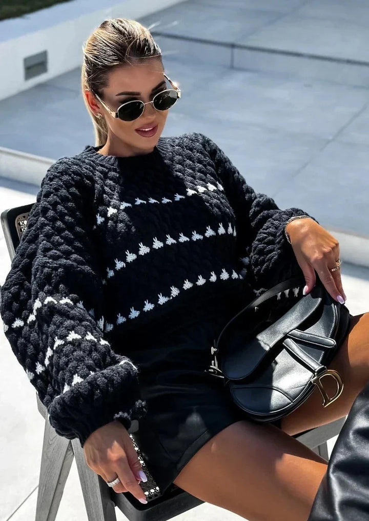 Women's textured crew neck sweater with contrasting geometric pattern