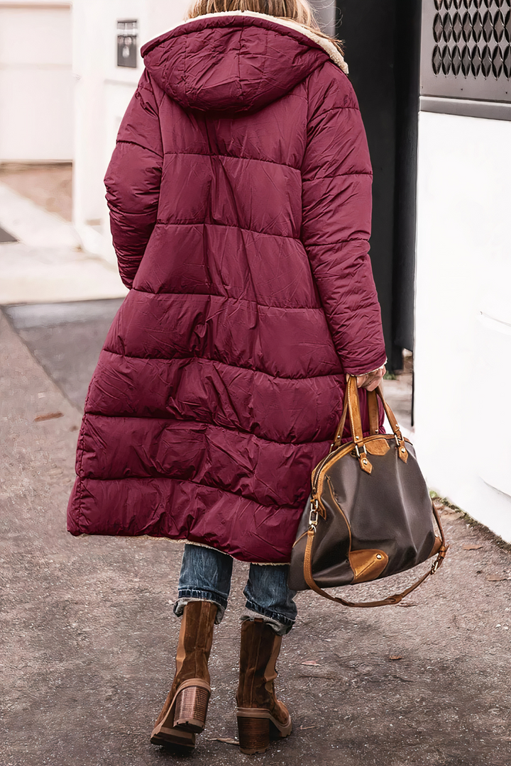 Women's long quilted hooded puffer coat with contrasting lining