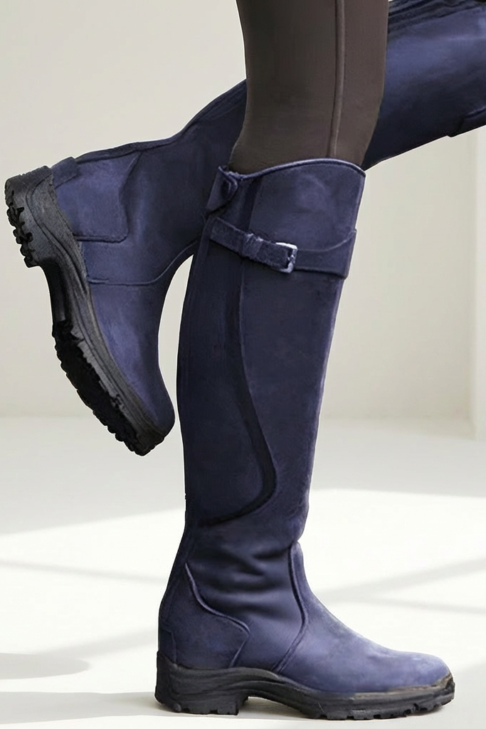 Women's knee-high boots with buckle strap and low heel