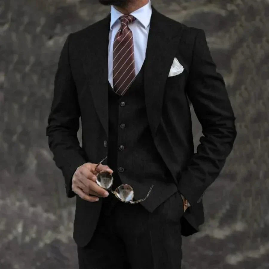Men's three-piece suit with notched lapel blazer, buttoned waistcoat and matching trousers