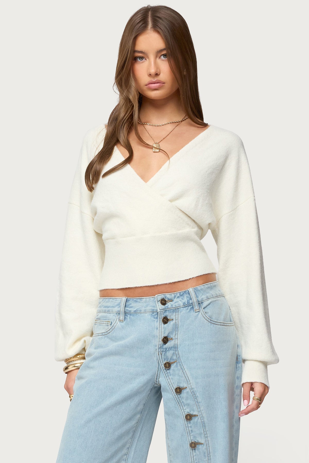 Women's cropped wrap sweater with V-neckline and long sleeves