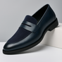 Men's penny loafers with a rounded toe, vamp strap and low heel