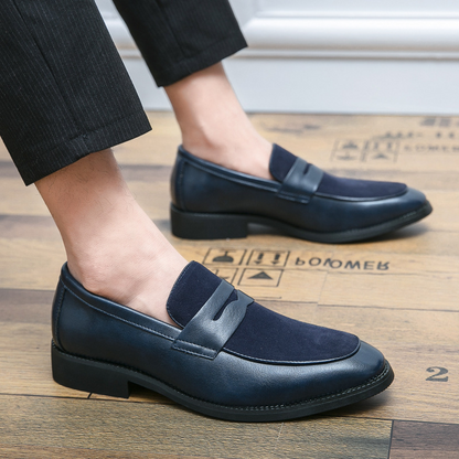 Men's penny loafers with a rounded toe, vamp strap and low heel